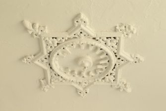 Interior. Detail of ceiling rose within 1st floor of stairwell