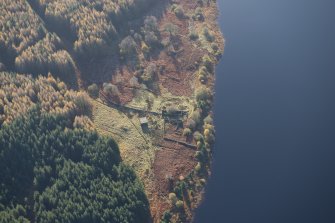 Oblique aerial view of Portmark farmstead and S end of tracked target range, looking SSW.