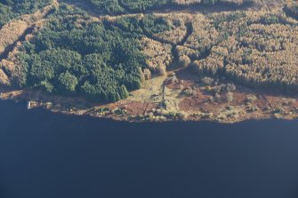 Oblique aerial view of Portmark farmstead and S end of tracked target range, looking ESE.