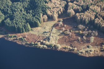 Oblique aerial view of Portmark farmstead and S end of tracked target range, looking E.