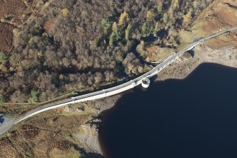 Oblique aerial view of Loch Doon Dam, looking NW.