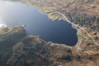 Oblique aerial view of Loch Doon Dam, looking W.