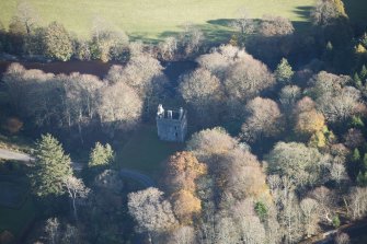 Oblique aerial view of Knockdolian Castle, looking E.