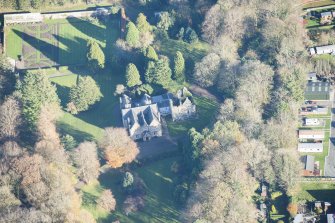 Oblique aerial view of Kirkhill House and Kirkhill Castle, looking ENE.
