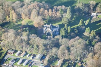 Oblique aerial view of Kirkhill House and Kirkhill Castle, looking WNW.