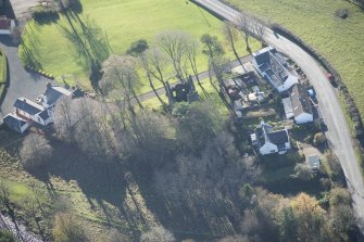 Oblique aerial view of Pinwherry Castle, looking SW.