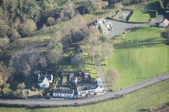 Oblique aerial view of Pinwherry Castle, looking ESE.