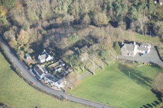 Oblique aerial view of Pinwherry Castle, looking NE.