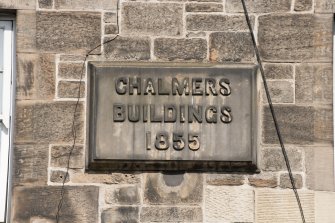 Detail of name plaque/datestone at 1-8 Chalmer's Buildings, 88 Fountainbridge, Edinburgh.