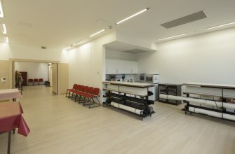 2nd floor. 'Breakout' space and kitchen from north west.