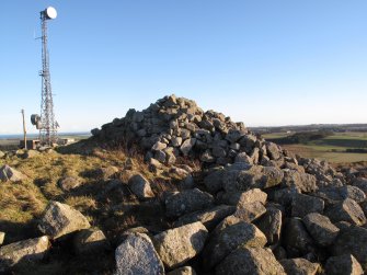 Drumcarrow Craig broch; view of later cairn atop broch wall at W.