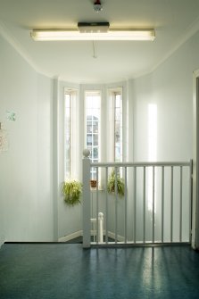 Interior. View of stairwell and first floor landing.