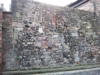 View of part of boundary wall to Gasworks, New Street, Edinburgh, off Old Tolbooth Wynd.