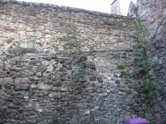 Detail of western boundary wall of Canongate Churchyard, Canongate, Edinburgh, to rear of Canongate Tolbooth, in Old Tolbooth Wynd, showing former roofline.