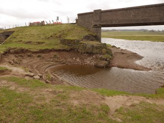 Detail view of south footings from east.