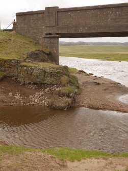 Detail view of south footings from east.