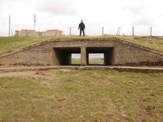 Spilway under road adjacent to bridge on south bank of River Clyde.