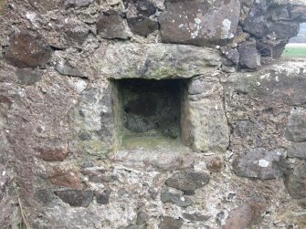 Knockdavie Castle. Detail of aumbry in eastern section of southern wall.