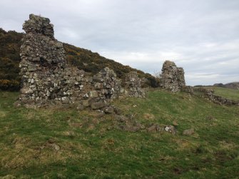 Knockdavie Castle. General view looking north east, with footings of a western range in the foreground.