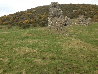 Knockdavie Castle. View of footings of western range.