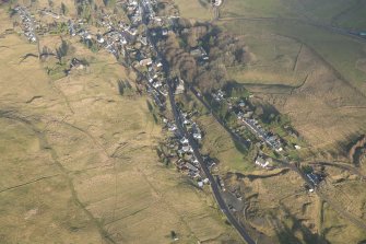 Oblique aerial view of Leadhills village and cultivation remains, looking NE.