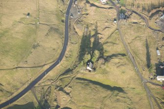 Oblique aerial view of the mining and cultivation remains centred on NS 8843 1436, looking N.