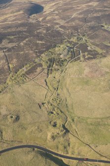 Oblique aerial view of the mining remains, looking WNW.
