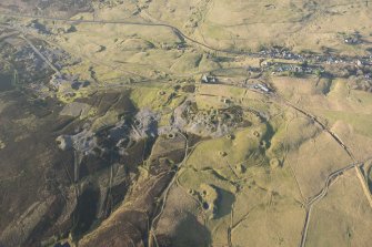 Oblique aerial view of the mining remains, looking W.