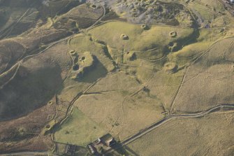 Oblique aerial view of the mining remains, looking WSW.