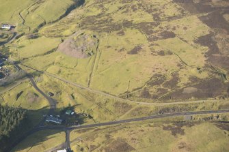 Oblique aerial view of the Wanlockhead mining remains, looking NW.