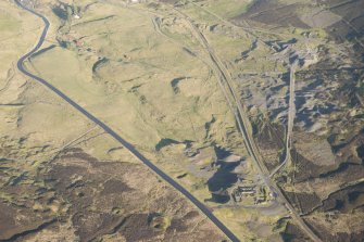 Oblique aerial view of the mining remains, looking ENE.