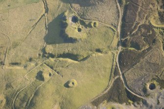 Oblique aerial view of the mining and cultivation remains at NS 8887 1425, looking SSE.