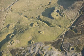 Oblique aerial view of the mining and cultivation remains at NS 8887 1425, looking ESE.