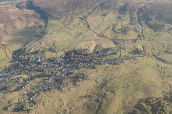 General oblique aerial view of Leadhills village, the mining remains and the golf course, looking E.