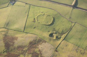 Oblique aerial view of the settlement and quarry, looking WSW.