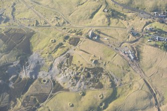 Oblique aerial view of the mining remains at Leadhills, looking WNW.