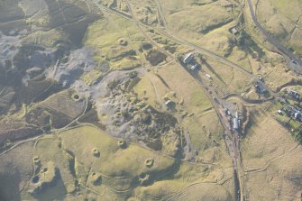 Oblique aerial view of the mining remains at Leadhills, looking WSW.