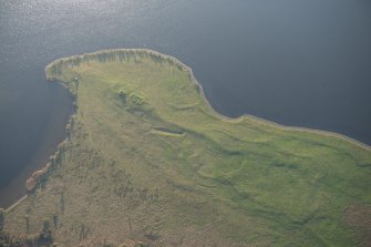 Oblique aerial view of St Serf's Island centred on the Priory Church, looking SE.