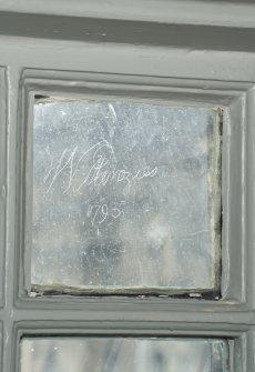 Second Floor. Bedroom. Detail of engraved signature in window.