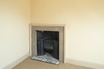 Second Floor. Bedroom. Fireplace from east.