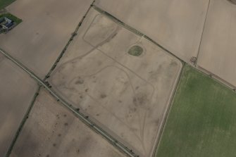 Oblique aerial view of the cairn after tree clearance, looking NW.