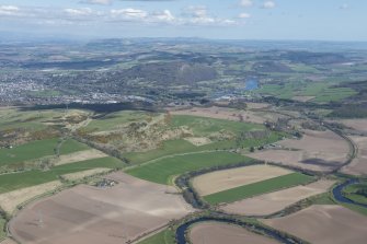 General oblique aerial view with Perth and the Friarton Bridge in the middle distance, Strathmore beyond and the Tay extending to the right, looking NE.