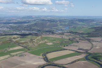 General oblique aerial view with Perth and the Friarton Bridge in the middle distance, Strathmore beyond and the Tay extending to the right, looking NE.