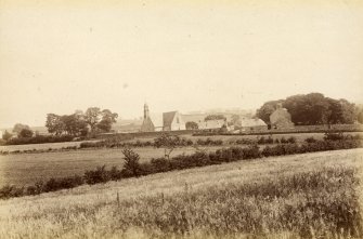 Distant view of Fenwick Parish Church and village.

