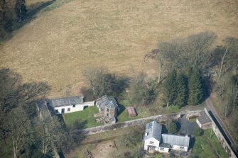 Oblique aerial view of Wyseby stables, walled garden and dovecot, looking NW.