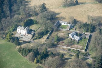 Oblique aerial view of Wyseby House, walled garden, stables and dovecot, looking WSW.