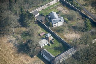 Oblique aerial view of Wyseby stables, walled garden and dovecot, looking NE.