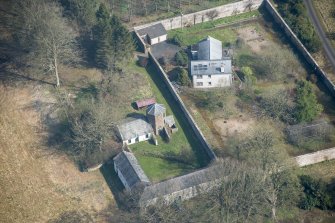 Oblique aerial view of Wyseby stables, walled garden and dovecot, looking NNE.