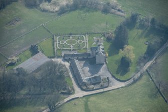 Oblique aerial view of Buittle Place Tower House, looking ESE.