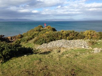 Castlehaven fort. General view from south showing field clearance in the foreground.